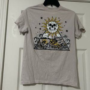 Spencer’s mushroom skull shirt